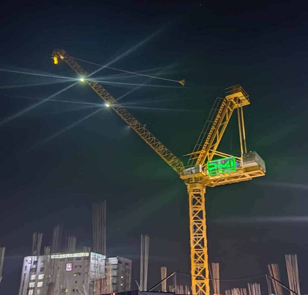Illuminated tower crane sign installed by King Signs Miami