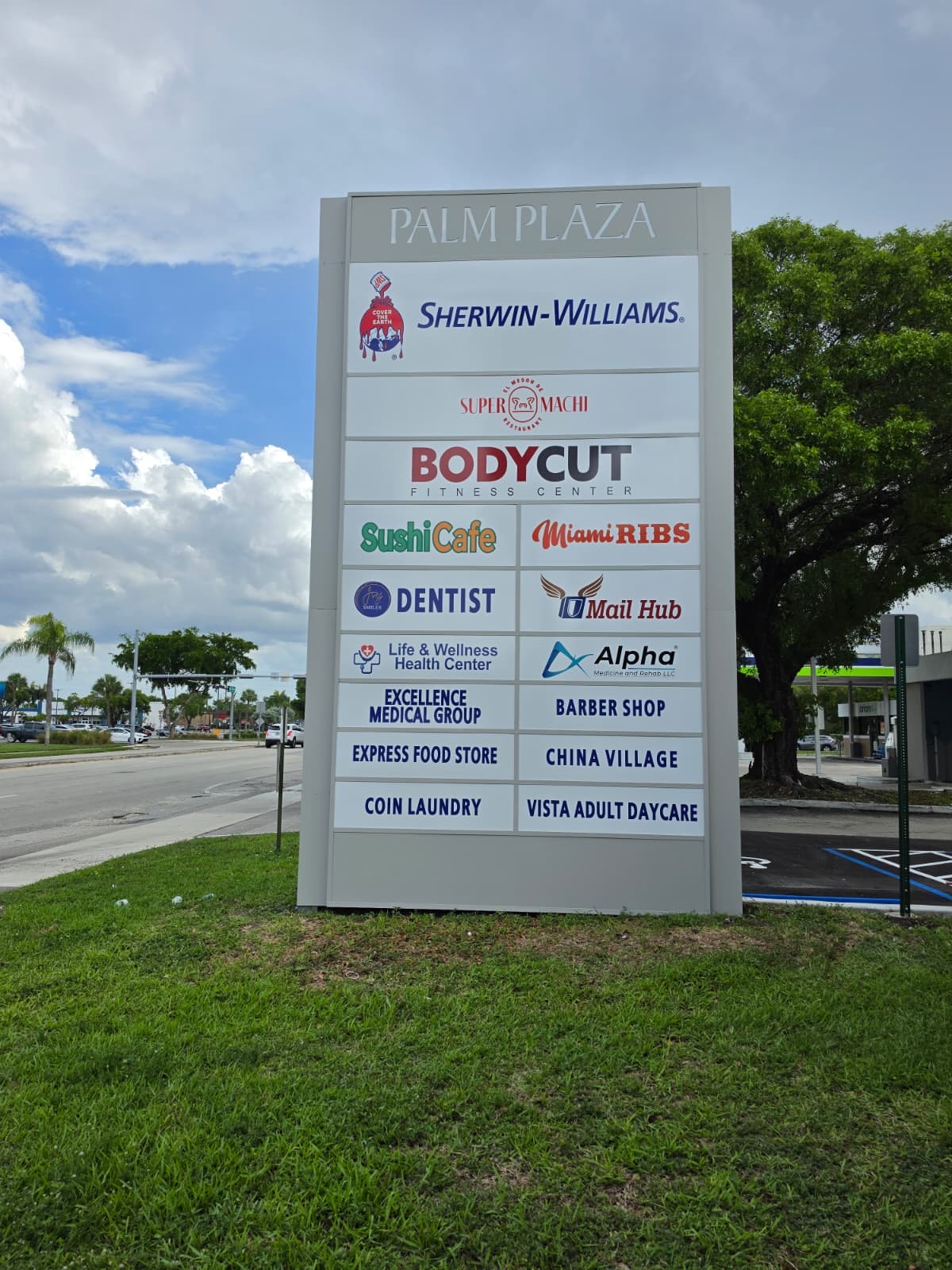 Completed Palm Plaza multi-tenant sign retrofit by King Signs Miami